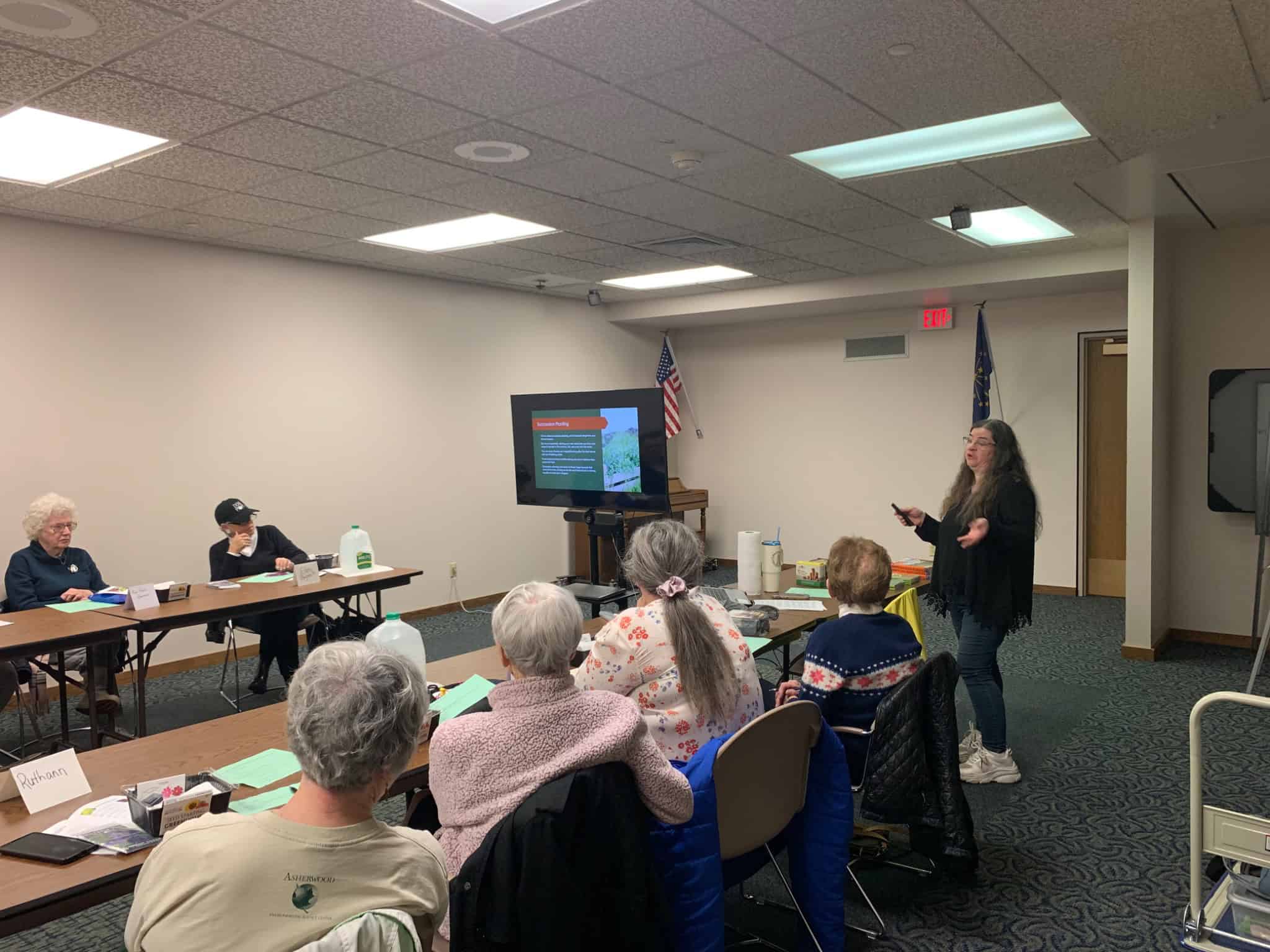 Sheri Ann Richerson giving a seed starting presentation to a gardening audience