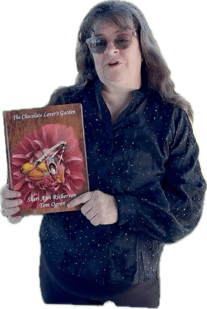 Sheri Ann Richerson holding The Chocolate Lover's Garden during a chocolate gardening presentation